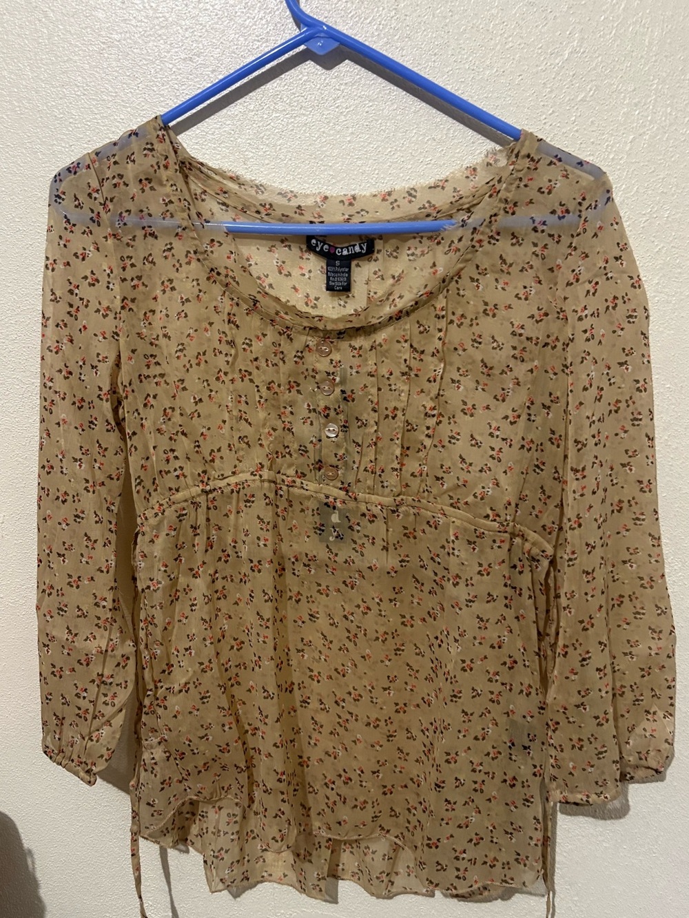 eye candy beige floral peasant blouse with red accents